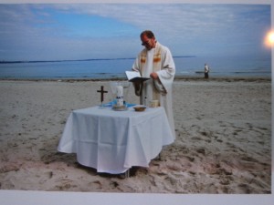 Strandtaufe Pastor Vogel bei einer Strandtaufe